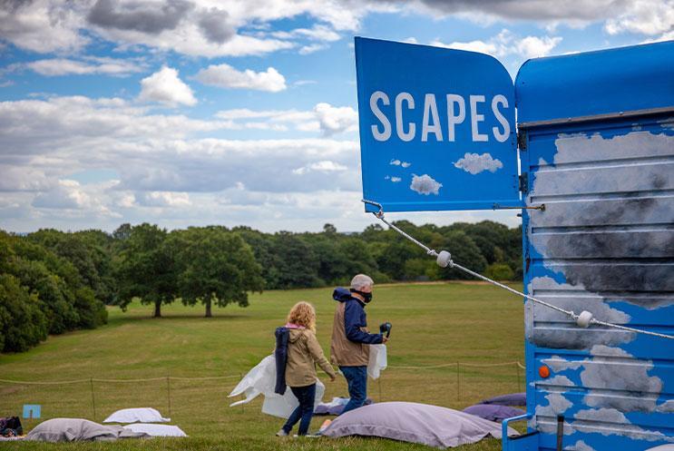 A field with giant beanbags on the ground