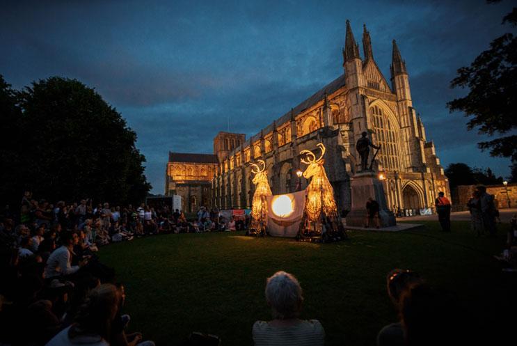 Giant illuminated puppet in Winchester Catherdral close